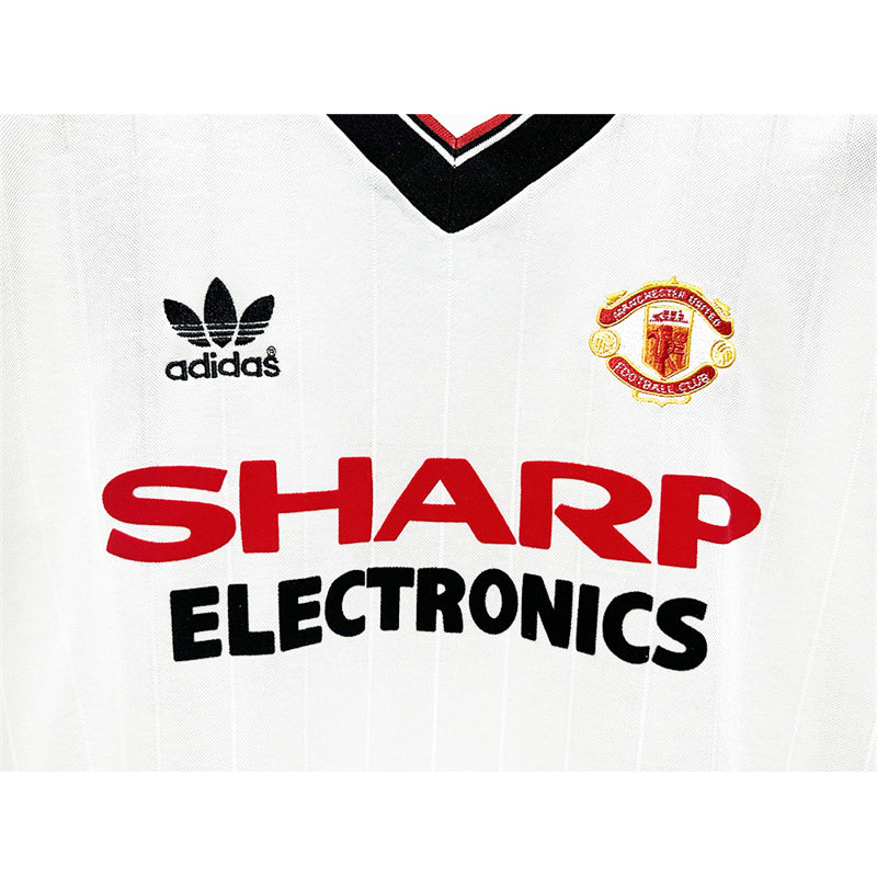 Manchester United 1982.83 away manga larga used